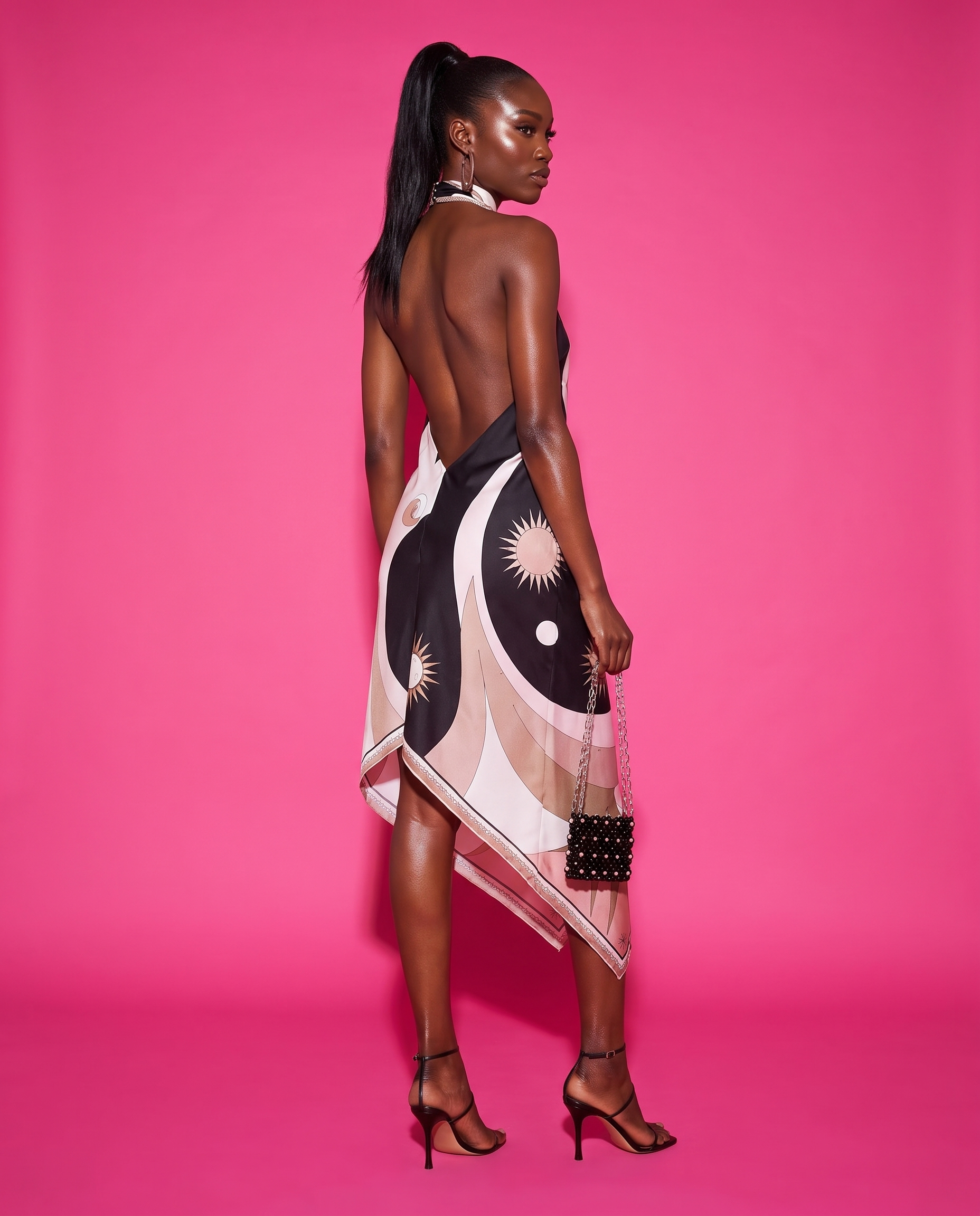Capri Halter Wrap Dress in Black celestial print, PLT studio style open back pose